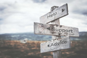 Help, support and advice signpost. Nature, adventure, message, text, quote concept.