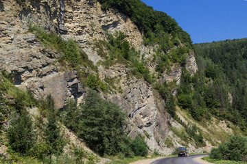 Truck goes along the mountain