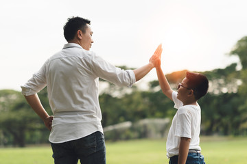 happy family running in the park, family asian group relation quality healthy support, home park .