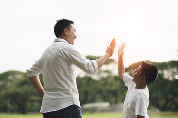 happy family running in the park, family asian group relation quality healthy support, home park .
