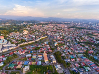 Top down aerial drone image of roof tops houses at Kota Kinabalu City, Sabah, Malaysia