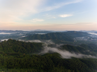 Aerial Drone image of beautiful Misty And Foggy dew during early morning sunrise at beautiful...