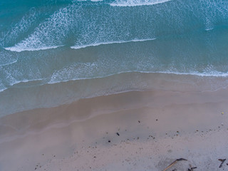 Aerial drone image of Beautiful white sandy beach with turquoise sea water beach at Kudat, Sabah, Borneo