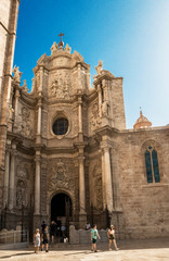 Obraz premium Valencia, Spain - 07/21/2019 Valencia Cathedral, La Plaza De La Reina - Square Reina Baroque, Romanesque and gothic style.