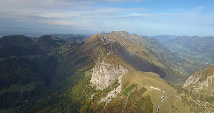 4k drone shot of montain peak with train pass