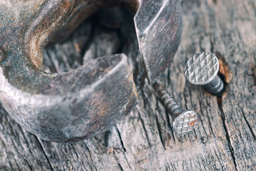 Tongs and bent nails