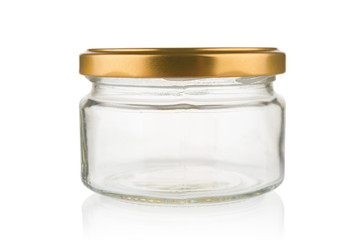 Empty glass jar close up on white background