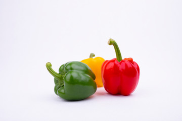 Three sweet peppers on white background.fresh bell pepper,Organic fresh vegetables