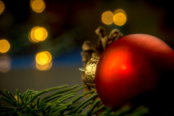 Christmas decorations closeup with blurred lights and cosy atmosphere