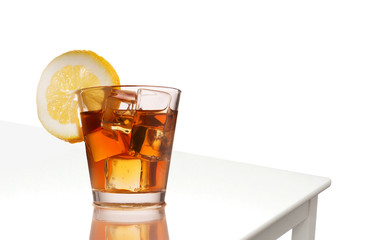 Glass of whiskey isolated white background. Glass of whiskey and ice on a white background