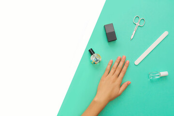 Manicured nails and tools for manicure.