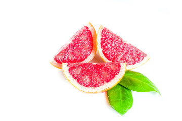Whole and sliced grapefruit isolated on white background