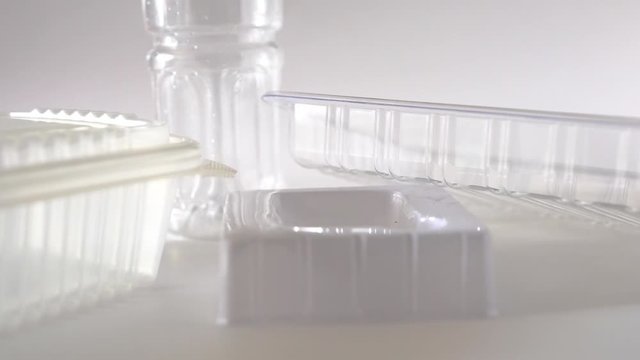 Plastic pollution, Urban product manufacturing, environmental concept scene of empty goods packaging, stop using disposable bottle, mold, bag and tableware...