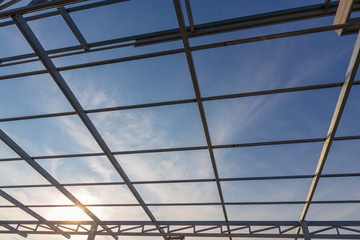 Structure of steel used to build accommodation. steel structure of the house on sky background. House construction.