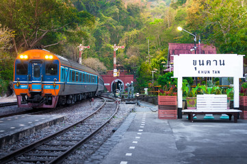 Naklejka na ściany i meble LAMPHUN, THAILAND - February 12, 2017 journey travel with train landmark Khuntan train station longest train tunnel in Thailand