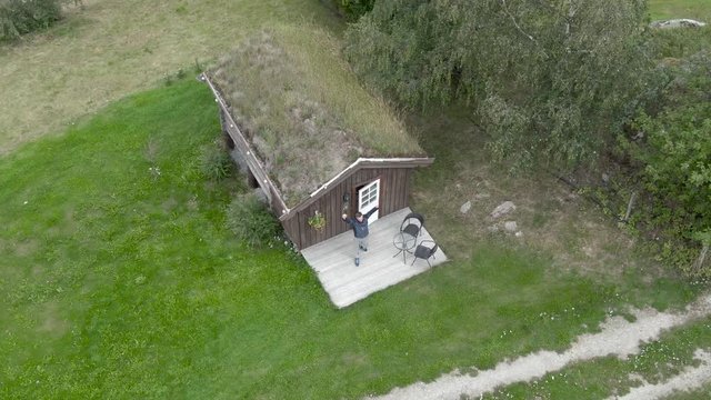A traditional turf house with grass on the roof, Norway