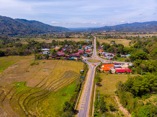 Beautiful Aerial image of rural landscape with beautiful young green paddy field in Tambunan, Sabah, Borneo