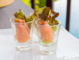 Salmon rolls as tapas cocktail