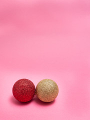 Glitter Christmas balls isolated on pink background, with copy space, Christmas concept