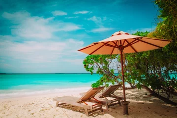 Fotobehang Two beach chairs on tropical sea vacation © nadezhda1906