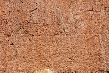 Ancient Fremont People petroglyphs make present day visitor aware of their existence oin the sandstone walls of Capitol Reef National Park, Utan