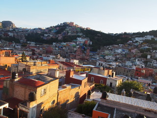 Scenic colorful old town streets with the sunset, Stunning city views of the historic building, Guanajuato, Mexico