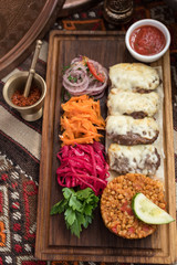 Middle Eastern Style Kofte Meatballs with Melted Cheese and Condiments, Kofte Kebab