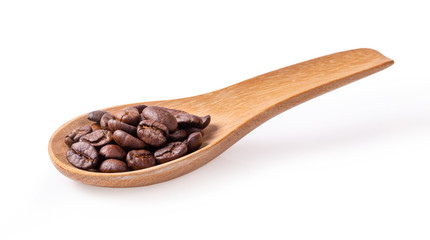roasted coffee beans in wood spoon isolated in white background