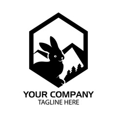 Fototapeta premium Rabbit silhouette logo with mountain in the hexagon, flat design. Vector Illustration on white background 
