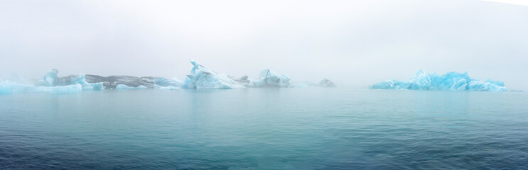 Fragments of iceberg in sea water. Iceland north sea