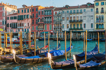 Fototapeta premium VENICE, ITALY- December 21, 2017 : Tourists on water street with Gondola in Venice,ITALY