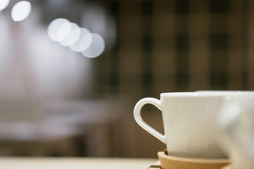 Hot coffee on wooden table.