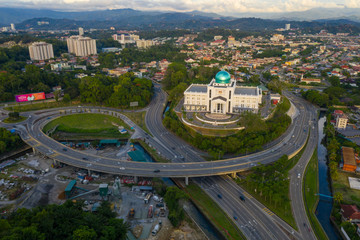 Aerial image of beautiful Kota Kinabalu City during twilight sunset on Sabah, Malaysia