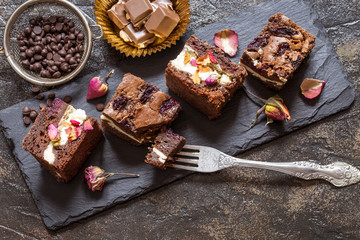 brownie with cherry and cream cheese and rose petals