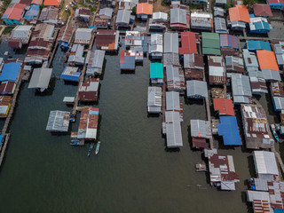 Top down aerial view of the local lifestyle traditional water village houses in a small village...