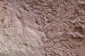 rough stone wall in brown color