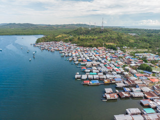 Top down aerial view of the local lifestyle traditional water village houses in a small village...