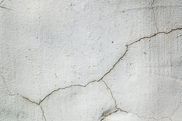 cracked and aged gray wall background