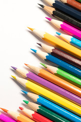 Background of stationery items notepad pencils shot closeup.