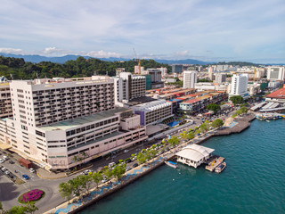 Kota Kinabalu cityscape aerial  photo with fisherman boat parking at Waterfront Kota Kinabalu. Kota...