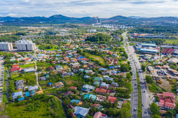 Aerial drone image of beautiful rural town local lifestyle houses residential of Menggatal Town, Sabah, Malaysia