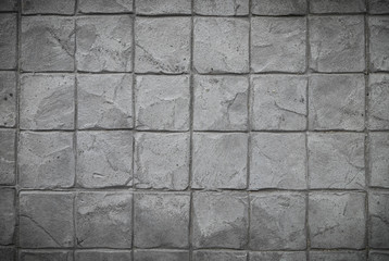 Vignette Cement Stamp square Pattern grey tone, Rock wall, close up.Abstract Texture background. Grey Stone block pattern Great details, surface for any design.