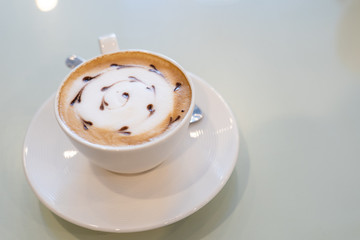 View of Coffe latte art on whtie o