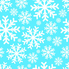 Fototapeta na wymiar Seamless pattern. White snowflakes on a blue background. Vector drawing. Texture.