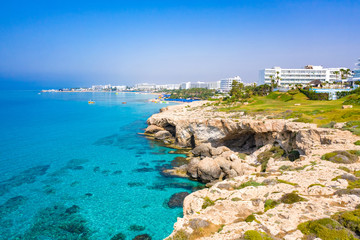 Fototapeta na wymiar Cyprus. Panorama Of The Ayia NAPA. Mountain coast of the Mediterranean sea. Tourist beaches of Cyprus. Blue lagoon. Resort towns of Cyprus. Hotels on the coast of Cyprus. Rest on the Mediterranean.