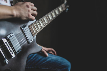 guy playing the guitar