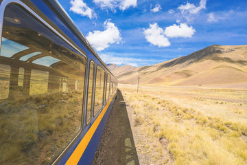 Wonderful view from the Peru Titicaca Train from Cusco to Puno, Peru. It is from Cuzco across the...