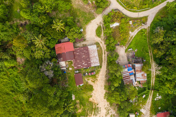 Aerial view of beautiful paddy field surrounding by small town at Penampang, Sabah, Borneo 