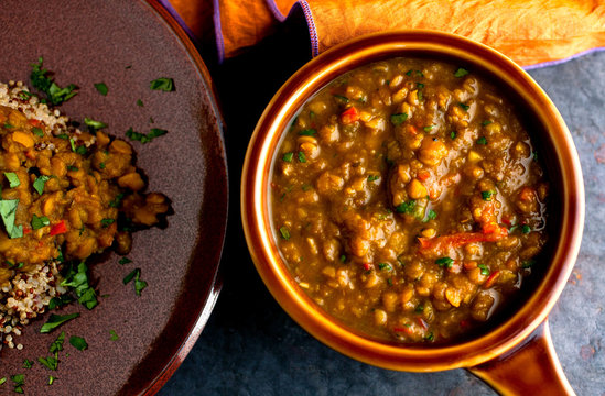 Overhead view of lentil dal with quinoa in sauce pan