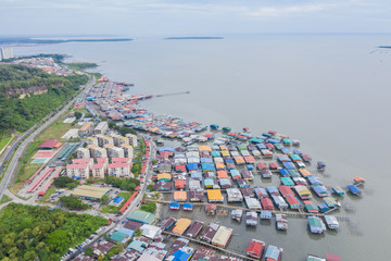 An aerial image of local water village houses at Kg. Sim Sim water village Sandakan City, Sabah,...